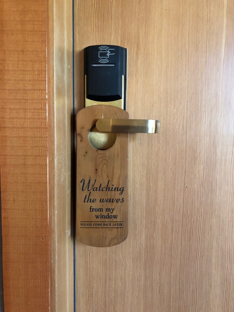 The Wick Inn watching the waves door hanger