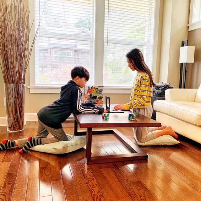 Kids playing Rubik's Race